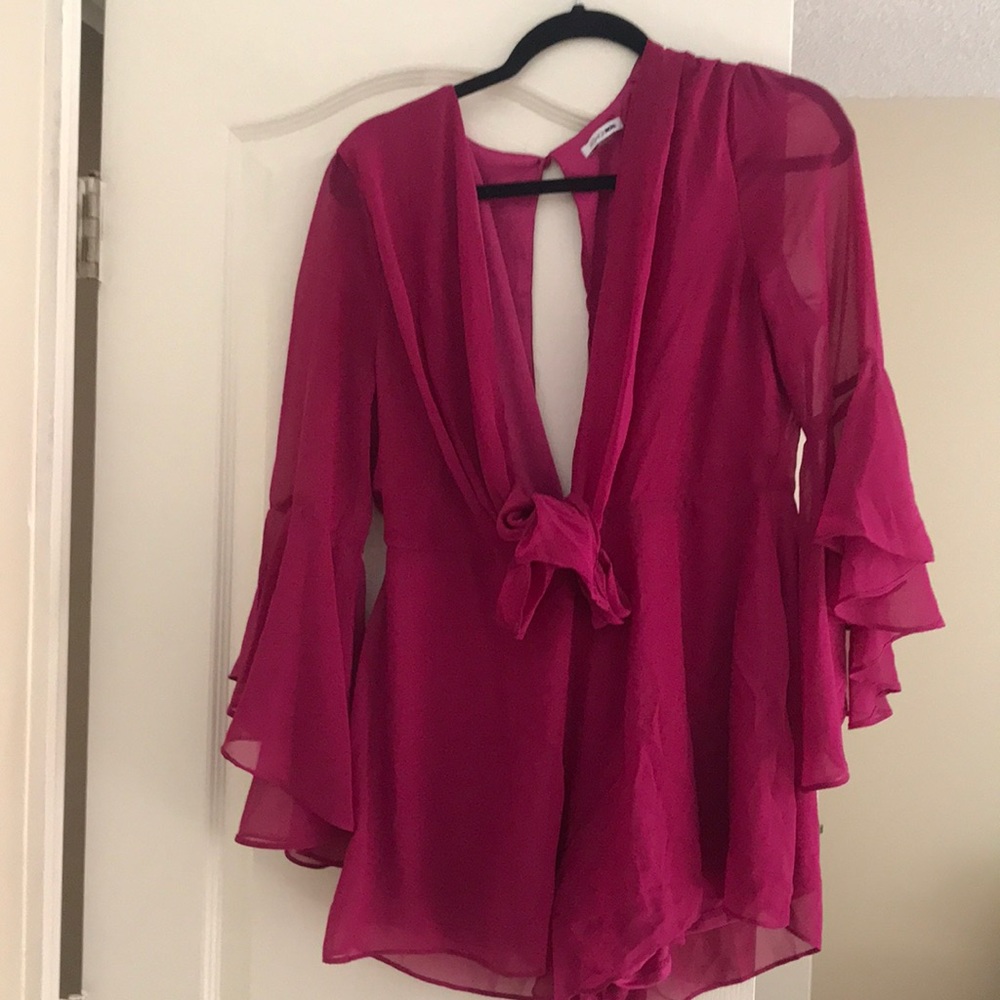 I’m selling a burgundy romper!